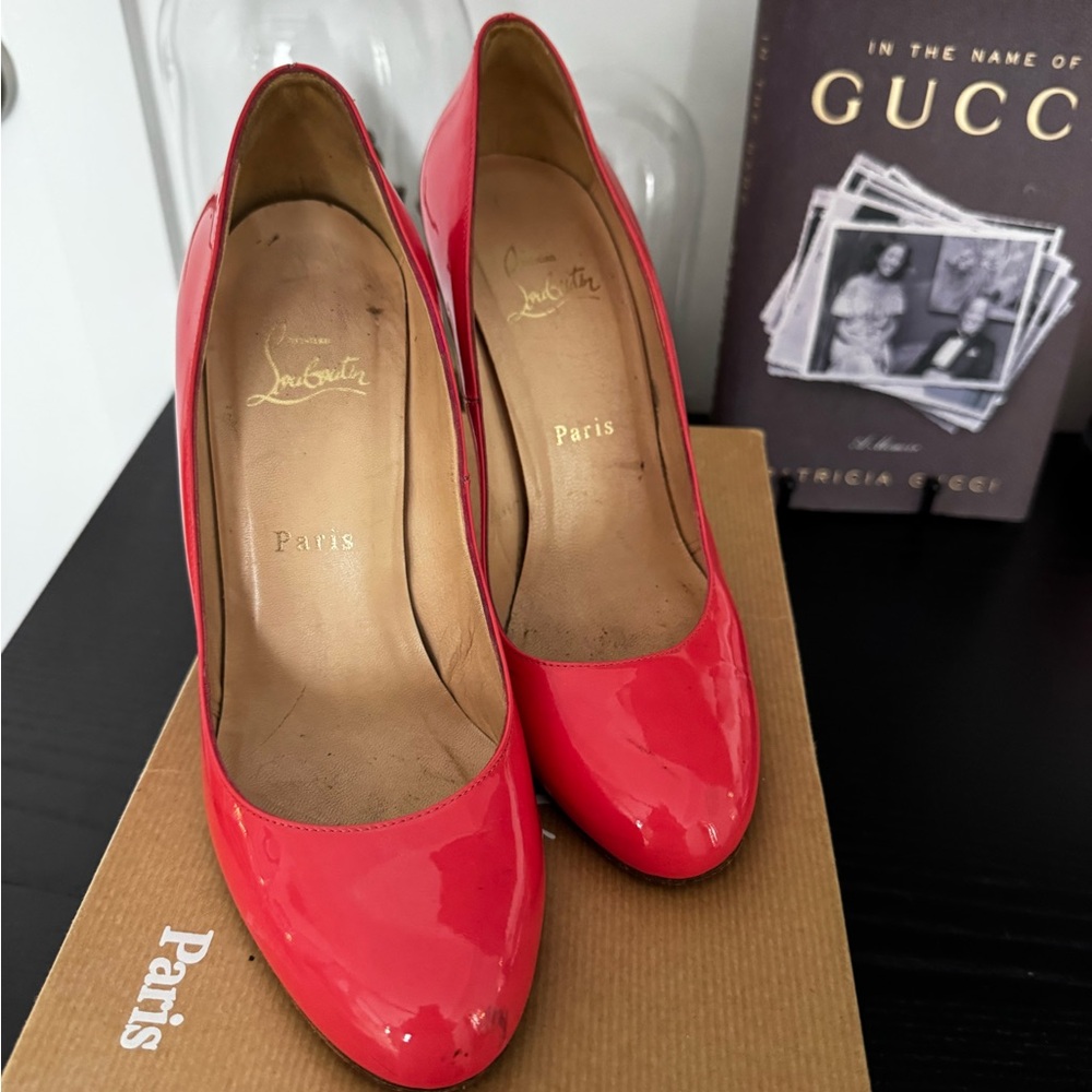 Christian Louboutin “Ron Ron” Pink Patent Leather Pumps